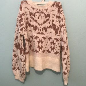 White and gold sweater